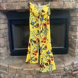 NWT Yellow, red and blue Floral jumpsuit. Strapless, but straps included. Large